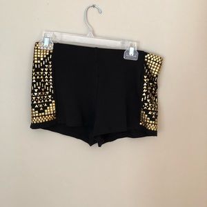 Stretchy gold and black shorts